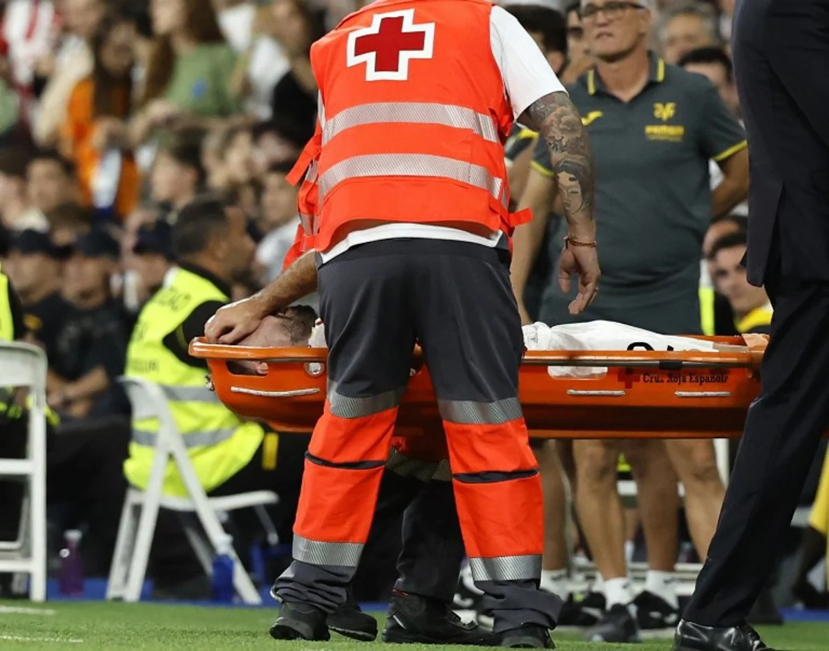 Real Madrid's Spanish defender #02 Dani Carvajal injured leaves the pitch on a stretcher during the Spanish league football match between Real Madrid CF and Villarreal CF at the Santiago Bernabeu stadium in Madrid on October 5, 2024.  OSCAR DEL POZO / AFP