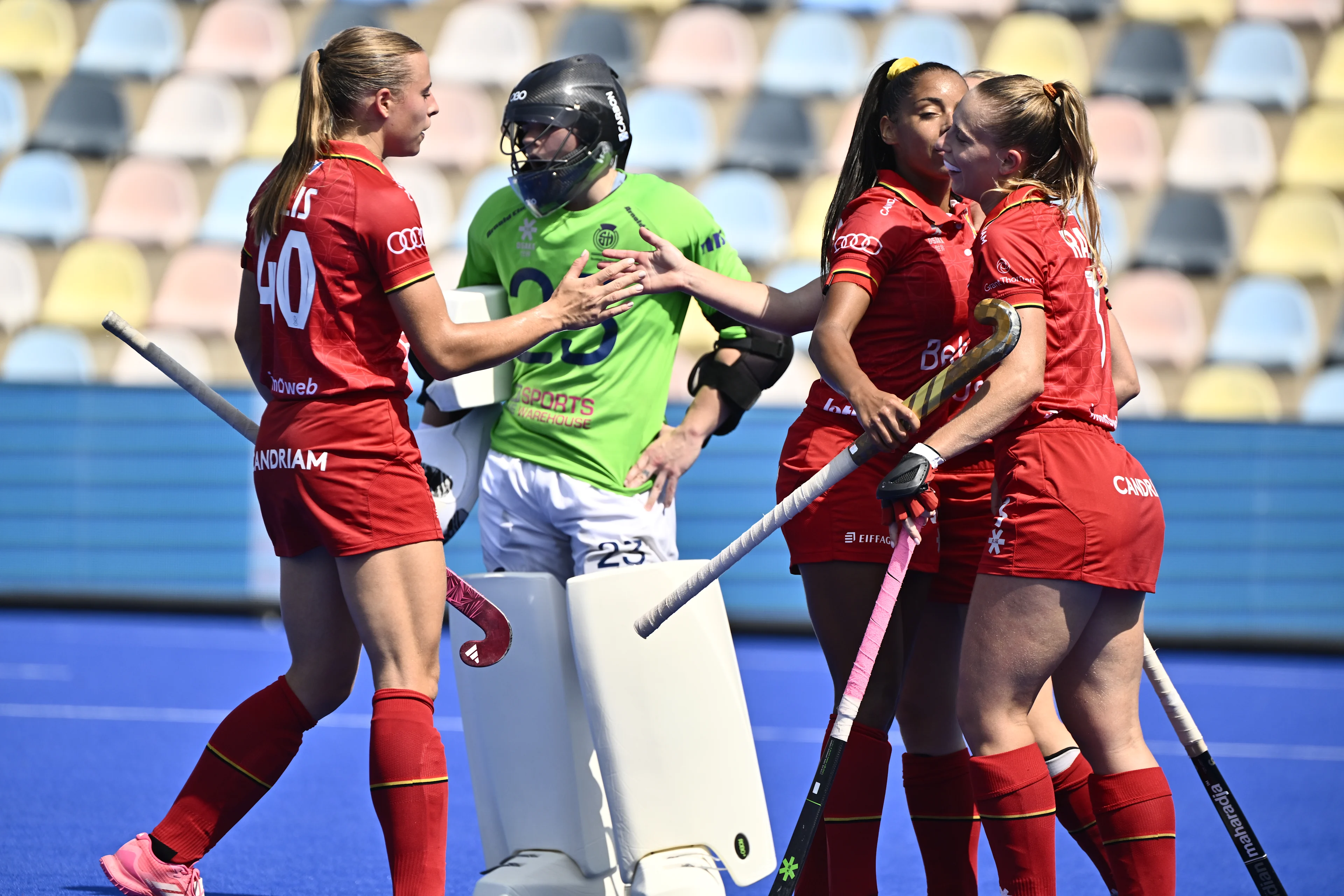 Belgium's Camille Belis, Belgium's Ambre Ballenghien and Belgium's Justine Rasir celebrate after a goal during a hockey game between Scotland and the Belgian national team Red Panthers, match 3/3 in the pool stage of the 2025 women's European championships, Wednesday 13 August 2025 in Monchengladbach, Germany. BELGA PHOTO ERIC LALMAND