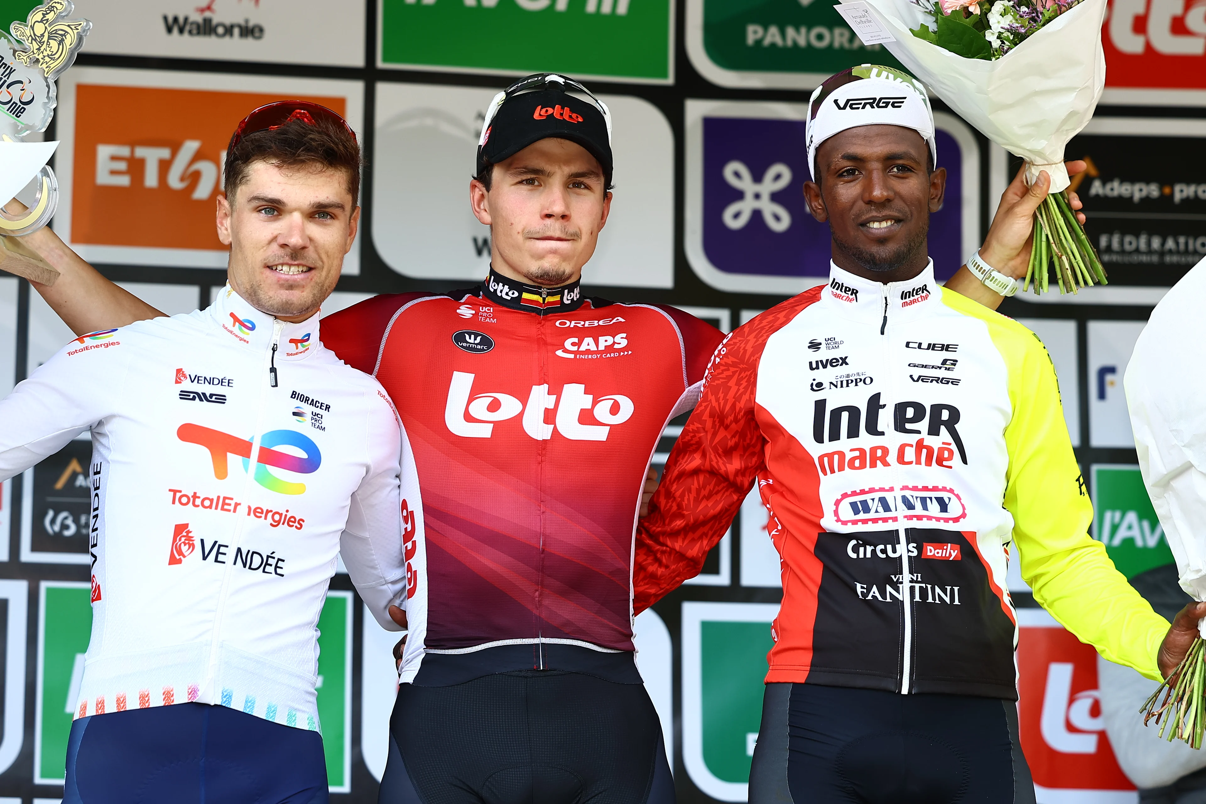 French Emilien Jeanniere of TotalEnergies, Belgian Arnaud De Lie of Lotto Cycling Team and Eritrean Biniam Girmay Hailu of Intermarche-Wanty pictured on the podium after the one day cycling race Grand Prix de Wallonie 2025 (187 km), in Namur, on Wednesday 17 September 2025. BELGA PHOTO DAVID PINTENS