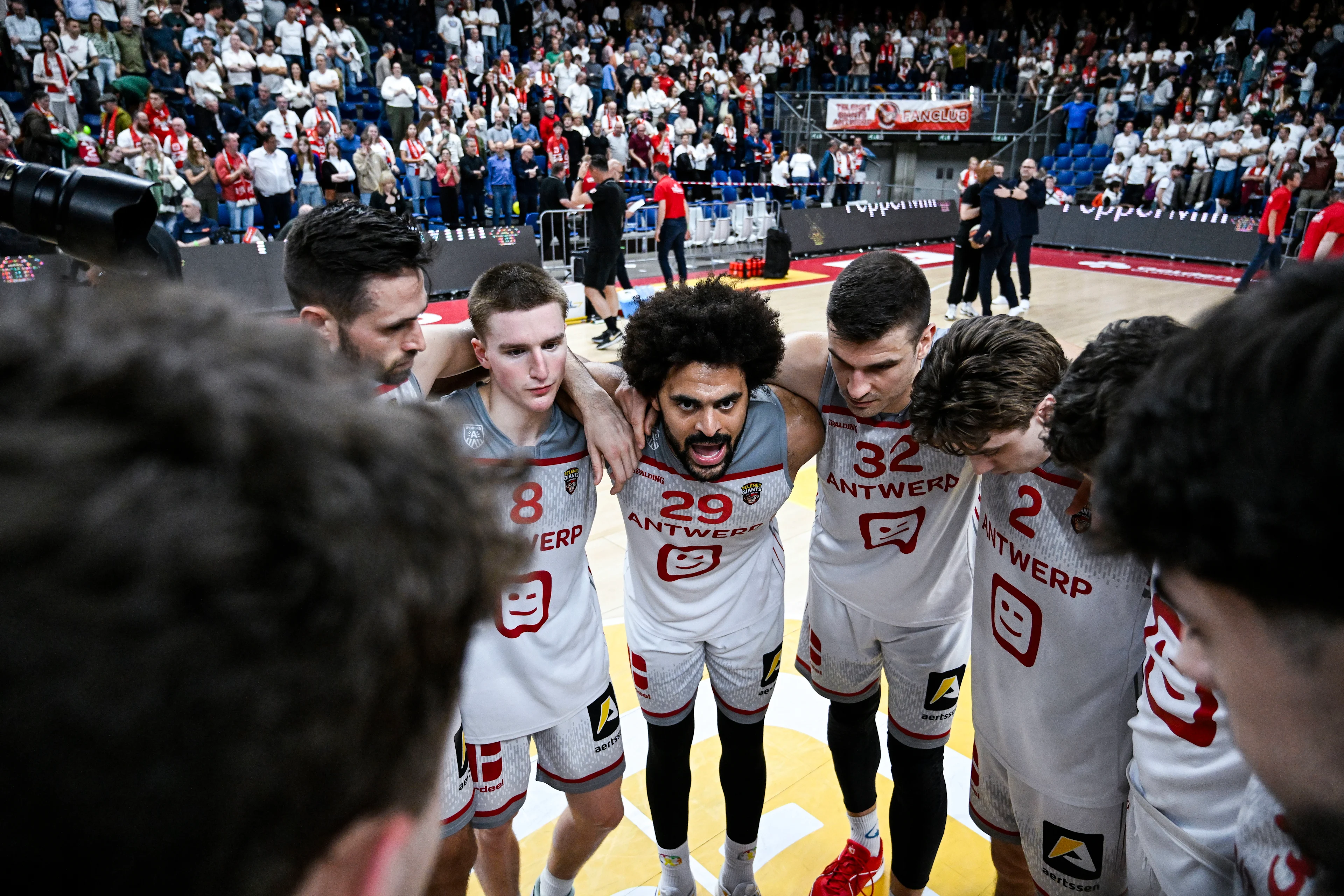 Antwerp's Jean-Marc Mwema and other players look dejected after losing a basketball match between Antwerp Giants and BC Oostende, Monday 03 June 2024 in Antwerp, match 4 (best of 5) of the Belgian finals of the 'BNXT League' first division basket championship. BELGA PHOTO TOM GOYVAERTS