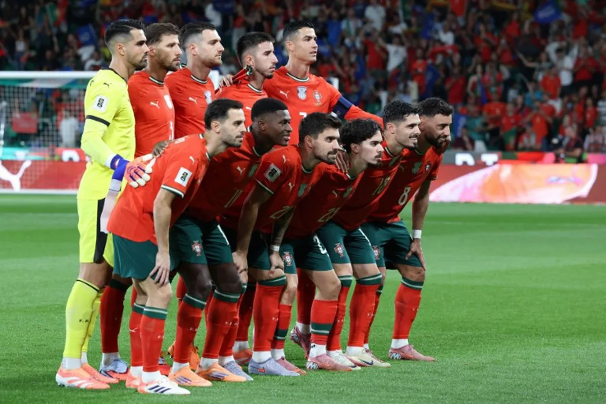 Portugal players pose for a team photo before the 2026 World Cup qualifier Europe zone group F football match between Portugal and Ireland at Jose Alvalade stadium in Lisbon on October 11, 2025. PATRICIA DE MELO MOREIRA / AFP