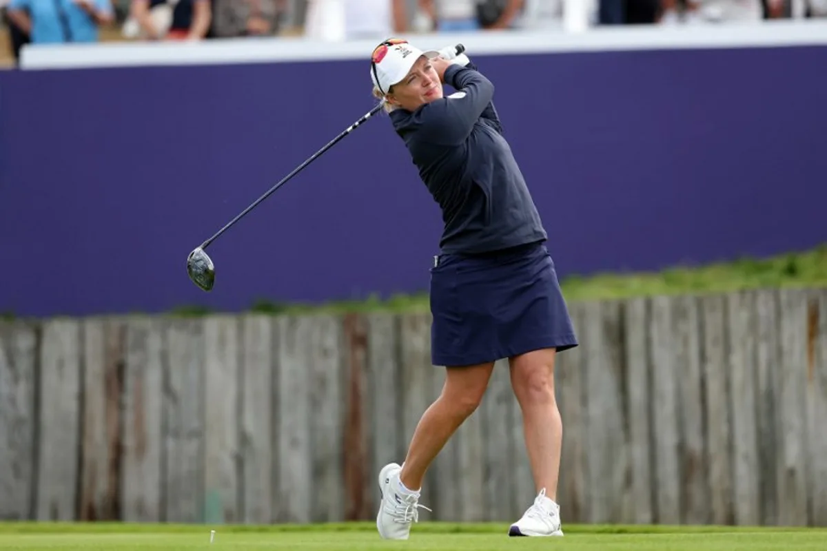 Belgium's Manon de Roey competes in round 1 of the women's golf individual stroke play of the Paris 2024 Olympic Games at Le Golf National in Guyancourt, south-west of Paris on August 7, 2024.   Pierre-Philippe MARCOU / AFP