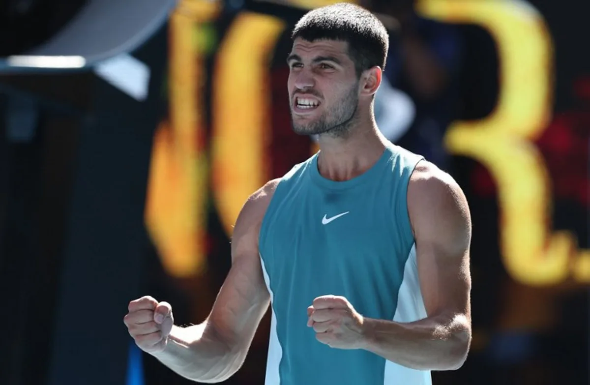 Spain's Carlos Alcaraz celebrates his victory against Portugal's Nuno Borges in their men's singles match on day six of the Australian Open tennis tournament in Melbourne on January 17, 2025.  Martin KEEP / AFP