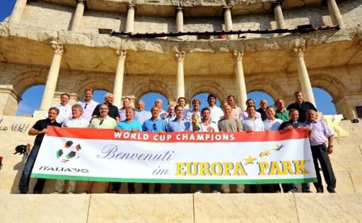 Germany's national football team and world champions of 1990 pose for a photo during the anniversary celebration of the German victory of the World Cup in 1990 on July 16, 2010 at the Europapark in Rust, southern Germany. Former German national football team players of the World Cup 1990 were invited by the German Football Association (DFB). AFP PHOTO POOL / OLIVER HURST