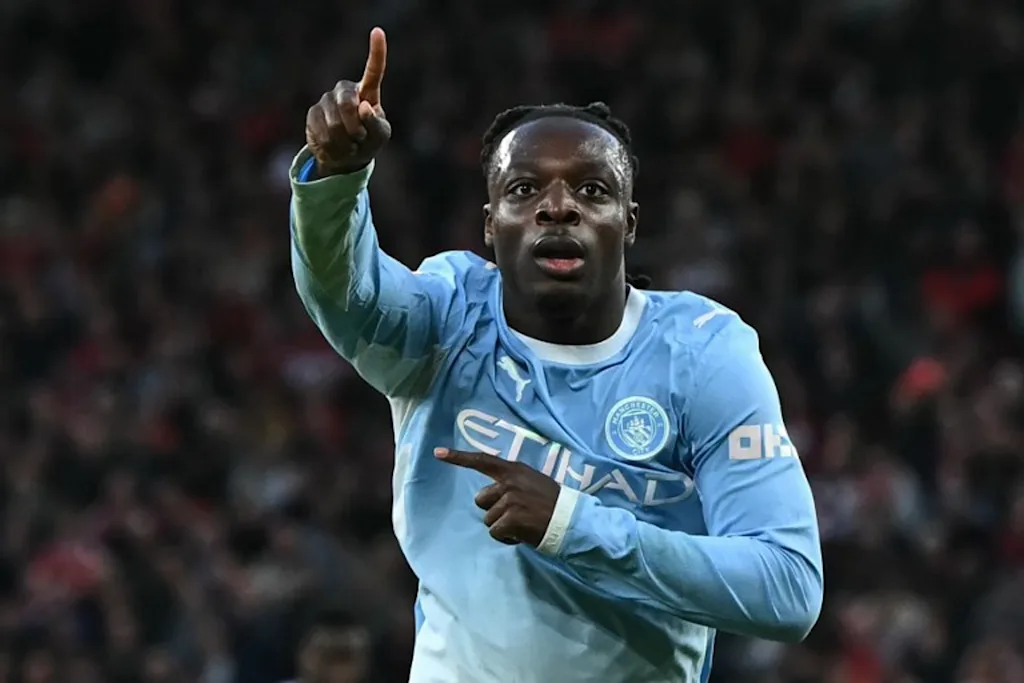 Manchester City's Belgian midfielder #11 Jeremy Doku celebrates after scoring their second goal during the English Premier League football match between Liverpool and Manchester City at Anfield in Liverpool, north west England on October 11, 2026.  Paul ELLIS / AFP