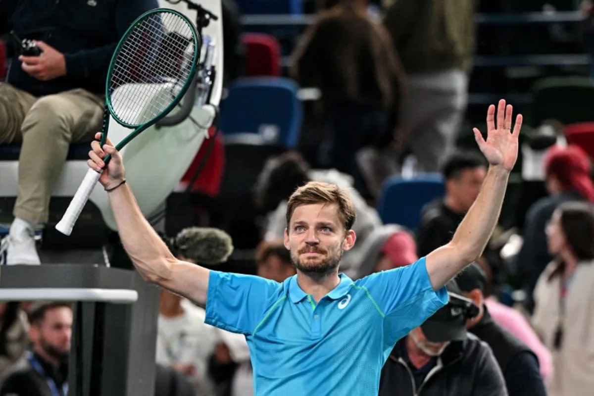 Belgium's David Goffin celebrates after winning his men's singles match against Germany's Alexander Zverev at the Shanghai Masters tennis tournament in Shanghai on October 9, 2024.   HECTOR RETAMAL / AFP