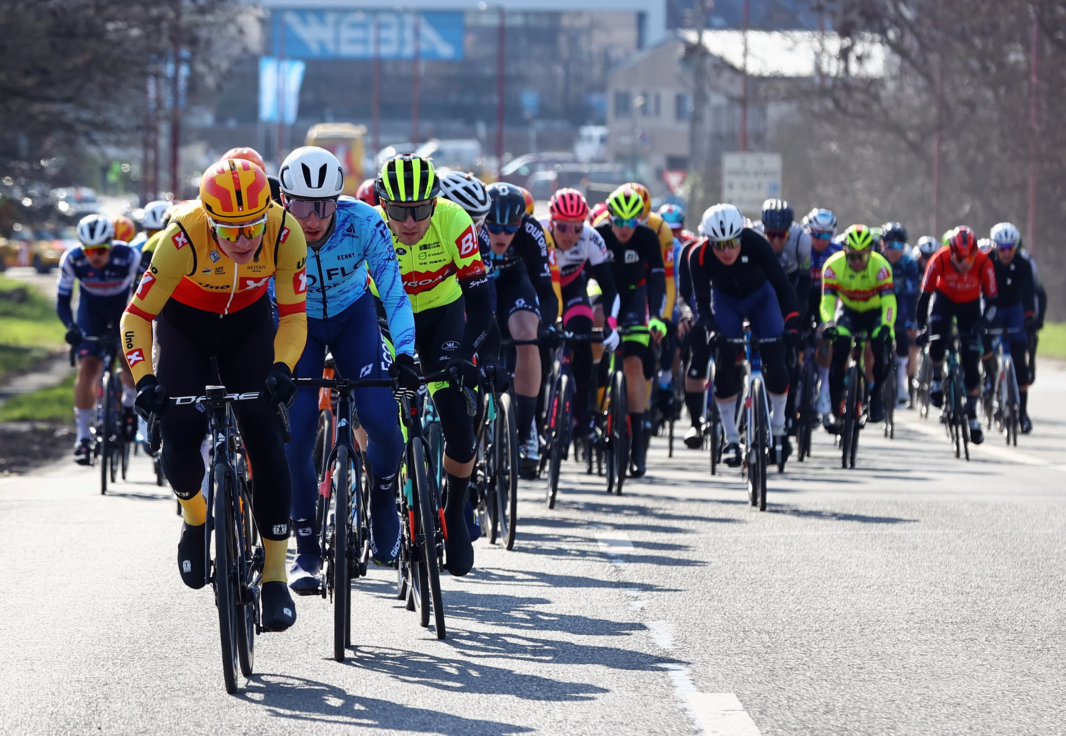 Illustration picture shows the pack of riders pictured during the Grand Prix du Samyn, one day cycling race, 209 km, from Quaregnon to Dour, first (out of 10) race of the Lotto Cycling Cup, Tuesday 28 February 2023, in Quaregnon. BELGA PHOTO DAVID PINTENS