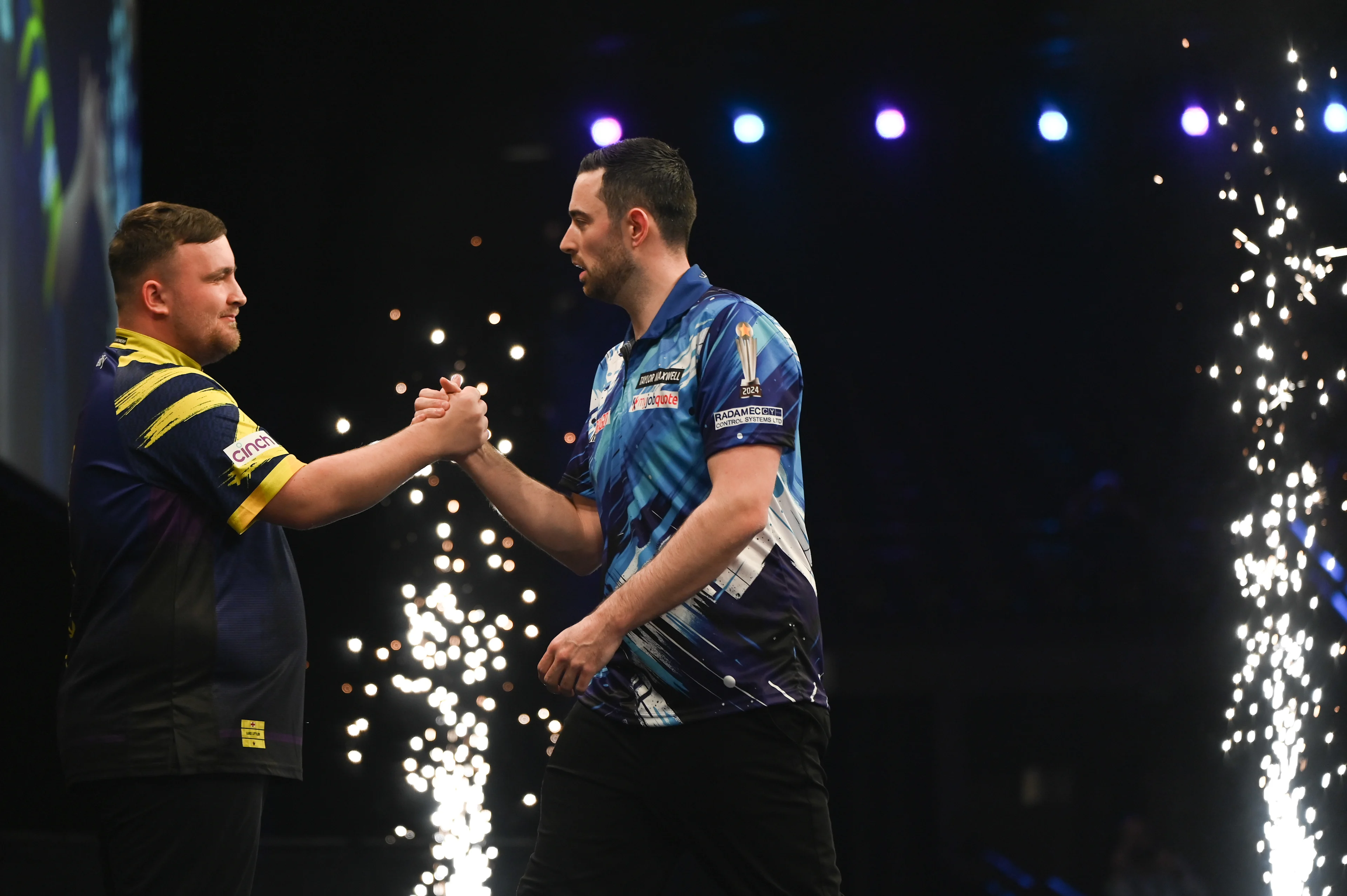 English Luke Littler and English Luke Humphries shake hands at the Premier League (Night 2/16) darts event in Antwerp on Thursday 12 February 2026. BELGA PHOTO ELIAS ROM