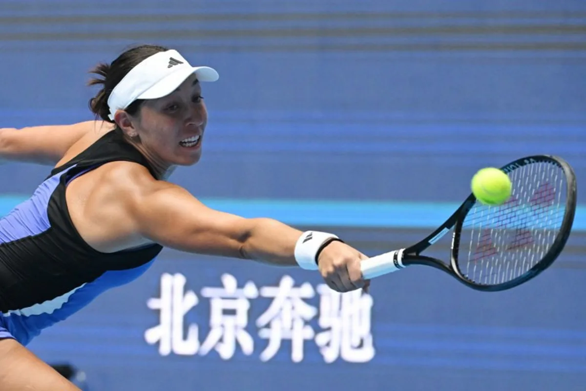 Jessica Pegula of the US reaches for a return to Russia's Veronika Kudermetova during their women's singles match at the China Open tennis tournament in Beijing on September 29, 2024.  GREG BAKER / AFP