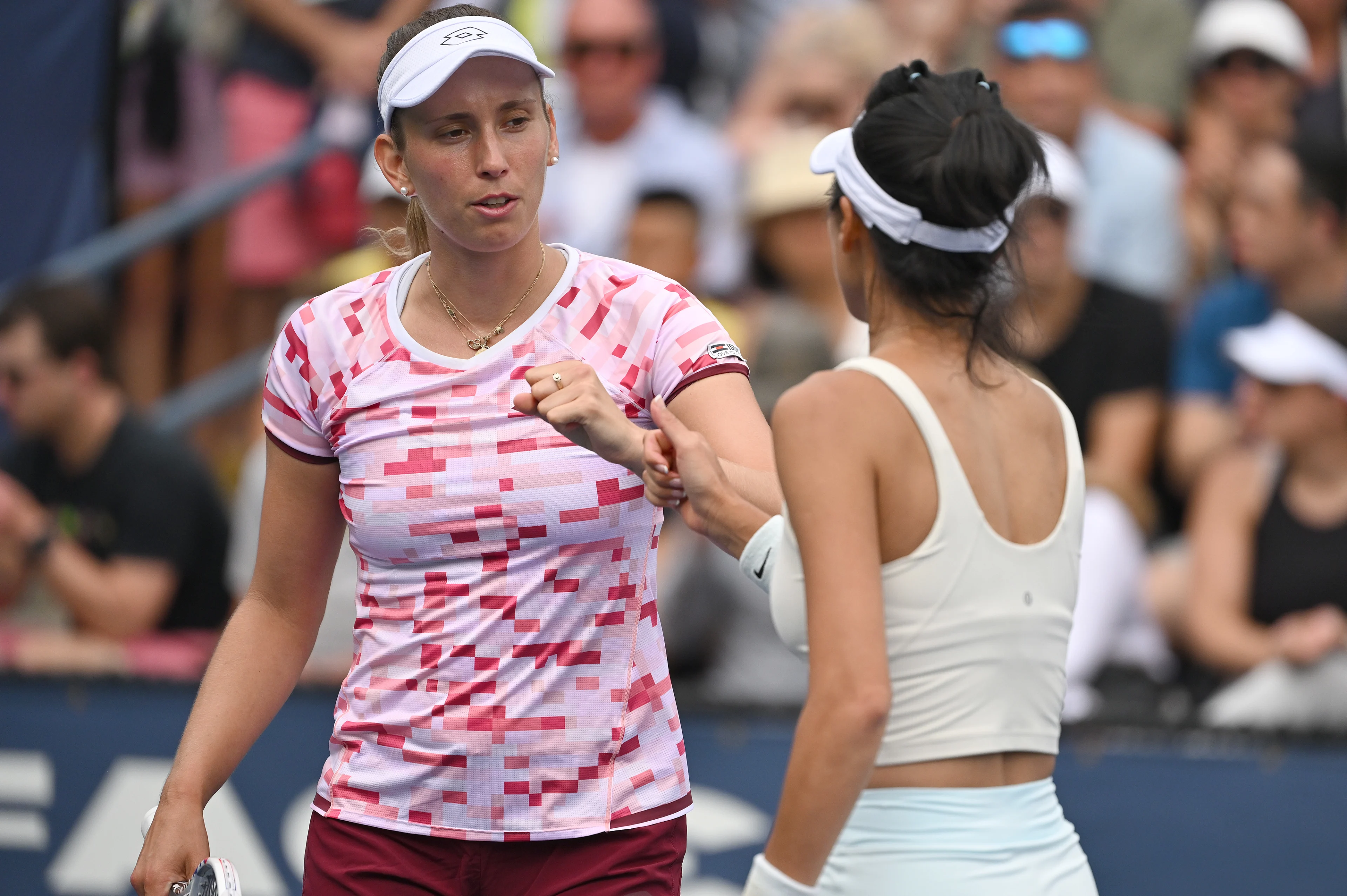 Elise Mertens of Belgium (pink) and Su-Wei Hsieh of Taipei play against Kristina Mladenovic of France and Shuai Zhang of China in the Women's Doubles: Round 1 at the 2024 U.S. Open tennis tournament at USTA Billie Jean King National Tennis Center, New York, NY, August 29, 2024. (Photo by Anthony Behar/Sipa USA)