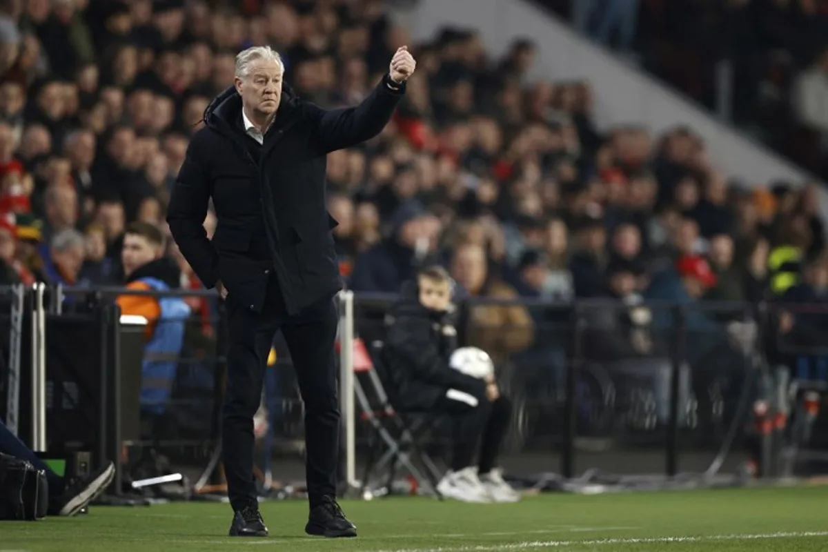 Willem II Belgian coach Peter Maes gestures from the techincal area during the Dutch Eredivisie match between PSV Eindhoven and Willem II at the Phillips Stadium in Eindhoven on February 8, 2025.  MAURICE VAN STEEN / ANP / AFP