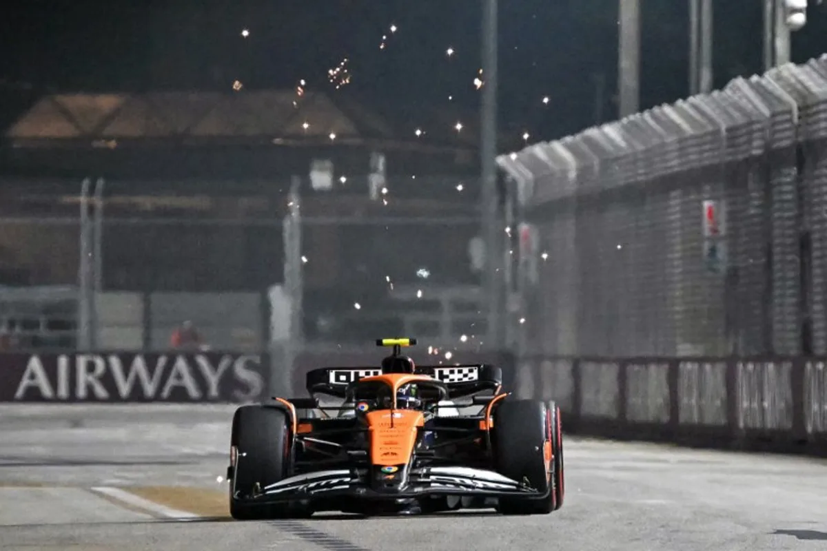 McLaren's British driver Lando Norris drives during the second practice session ahead of the Formula One Singapore Grand Prix night race at the Marina Bay Street Circuit in Singapore on September 20, 2024.  ROSLAN RAHMAN / AFP