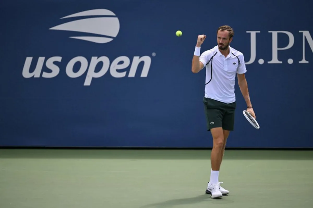 Russia's Daniil Medvedev reacts after a point against France's Arthur Rinderknech during their men's singles third round tennis match on day six of the US Open tennis tournament at the USTA Billie Jean King National Tennis Center in New York City on September 4, 2026.  ANGELA WEISS / AFP