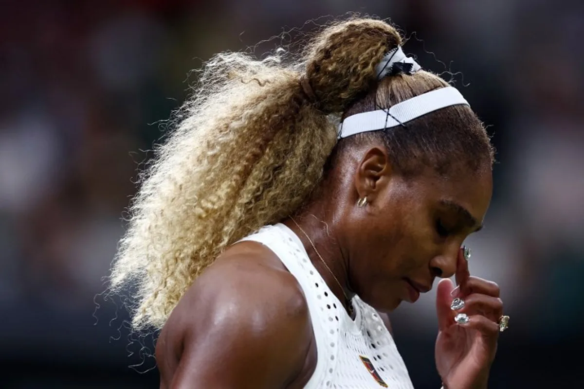 US player Serena Williams reacts as she plays against Australia's Maya Joint during their women's singles first round tennis match on the second day of the 2026 Wimbledon Championships at The All England Lawn Tennis and Croquet Club in Wimbledon, southwest London, on June 30, 2026. HENRY NICHOLLS / AFP