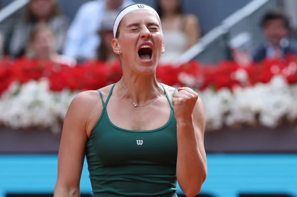 Ukraine's Marta Kostyuk reacts as she plays against Russia's Mirra Andreeva during the 2026 WTA Tour Madrid Open tennis tournament final singles match at the Caja Magica in Madrid, on May 2, 2026.  Thomas COEX / AFP