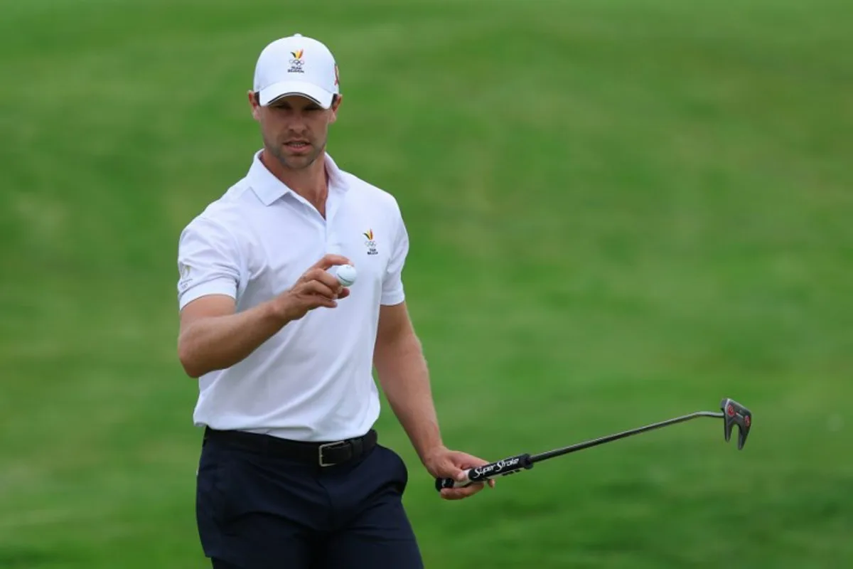 Belgium's Thomas Detry reacts in round 3 of the men's golf individual stroke play of the Paris 2024 Olympic Games at Le Golf National in Guyancourt, south-west of Paris on August 3, 2024. Emmanuel DUNAND / AFP