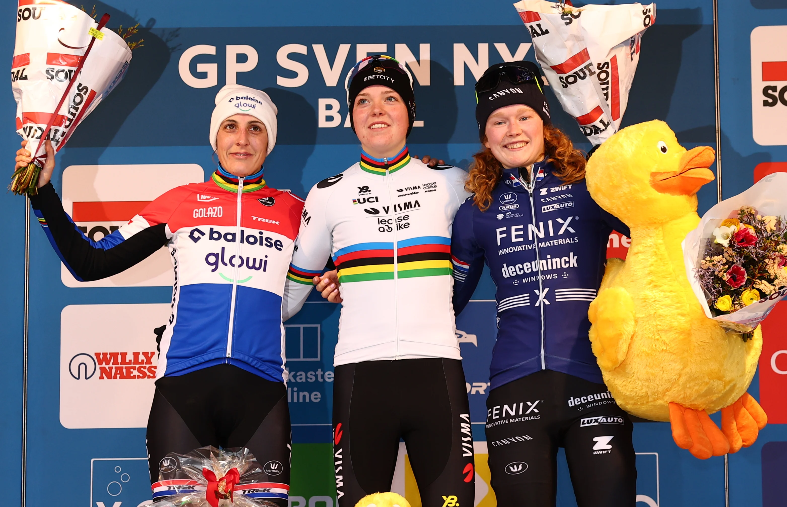 Dutch Lucinda Brand, Dutch Fem Van Empel and Dutch Puck Pieterse pictured on the podium after the women's elite race of the 'GP Sven Nys' cyclocross cycling event on Wednesday 01 January 2025 in Baal, stage 5/8 in the X2O Badkamers 'Trofee Veldrijden' competition. BELGA PHOTO DAVID PINTENS