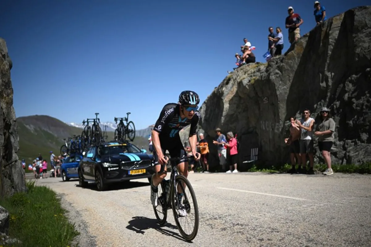 Team DSM team's American rider Kevin Vermaerke climbs the "Col de la Croix de Fer" during the seventh stage of the 74th edition of the Criterium du Dauphine cycling race, 135kms between Saint-Chaffrey to Vaujany, south-eastern France, on June 11, 2022. Marco BERTORELLO / AFP