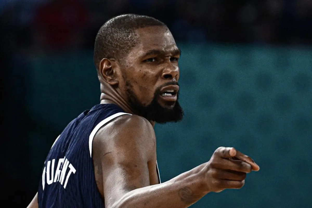 USA's #07 Kevin Durant gestures in the men's Gold Medal basketball match between France and USA during the Paris 2024 Olympic Games at the Bercy Arena in Paris on August 10, 2024. Aris MESSINIS / AFP