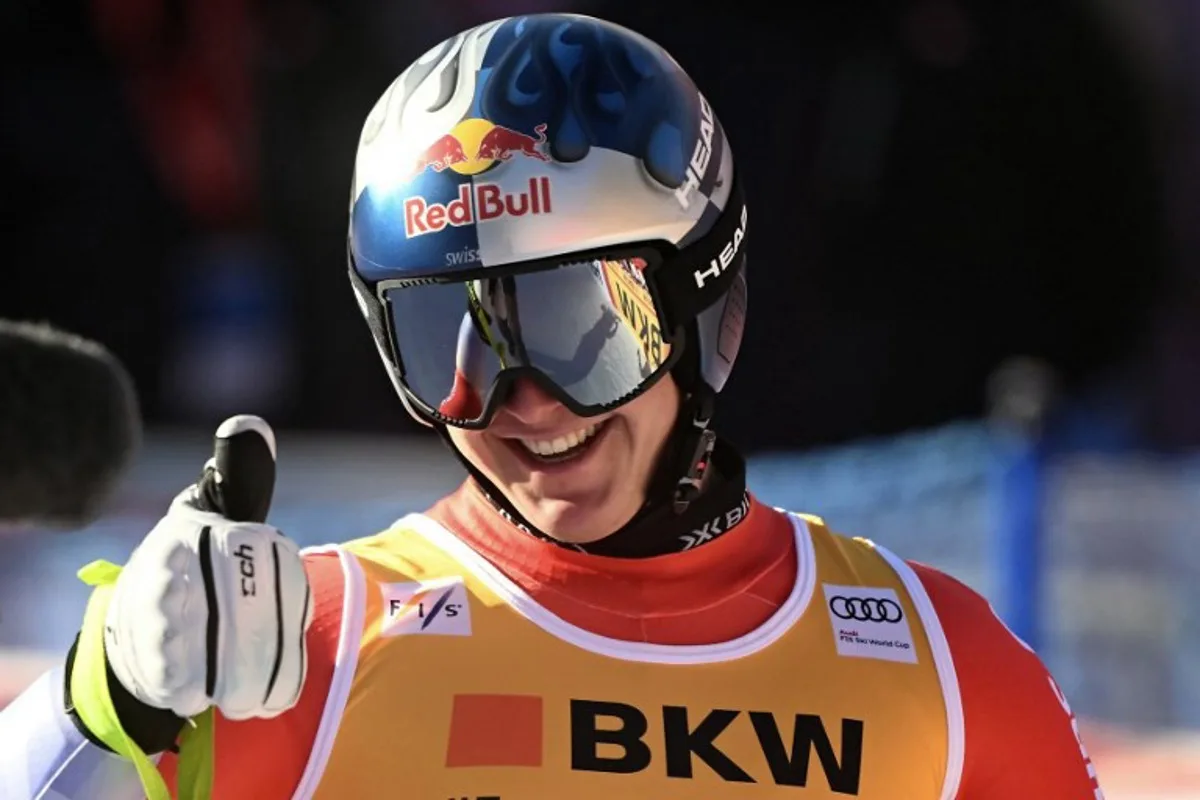 Switzerland's Franjo Von Allmen arrives in the finish area after competing in the men's Super-G event at the FIS Alpine Skiing World Cup event in Wengen on January 17, 2025.    Marco BERTORELLO / AFP