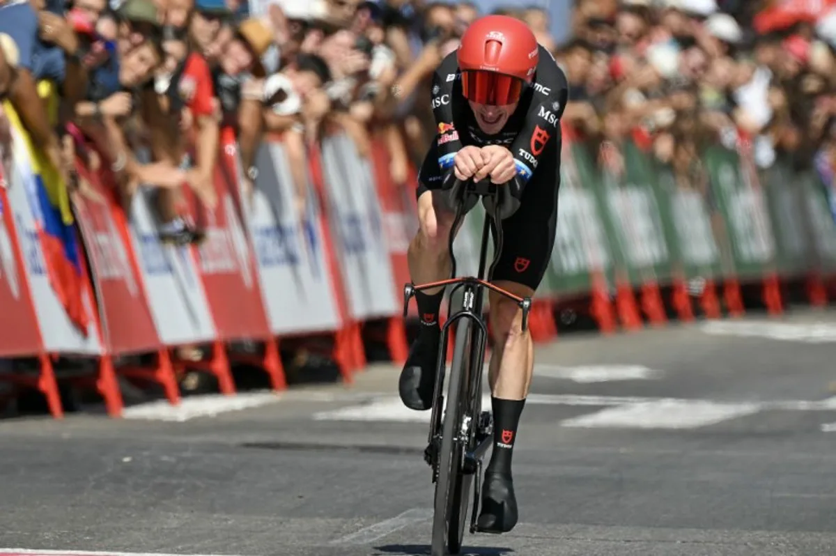 Team Tudor Pro Cycling Team's Swiss rider Stefan Kung crosses the finish line of the 18th stage of the Vuelta a Espana 2026 cycling tour, a 32,1 km individual time-trial race between El Puerto de Santa Maria and Jerez de la Frontera, on September 10, 2026.   JORGE GUERRERO / AFP
