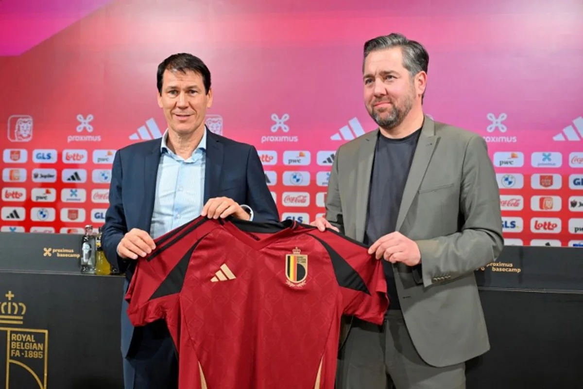 The new coach of the Belgian national football team, Rudi Garcia (L) poses with Belgian Sports Director, Vincent Mannaert during a press conference, in Tubize, on January 24, 2025. Belgium's football federation on January 24, 2025 announced Frenchman Rudi Garcia as the new national team coach, after the sacking of Domenico Tedesco. Nicolas TUCAT / AFP