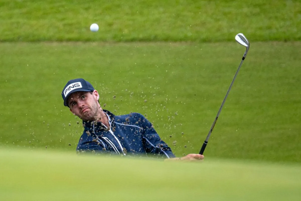 USA's Alex Smalley plays a shot during the Baycurrent Classic golf tournament in Yokohama on October 11, 2025.  Philip FONG / AFP