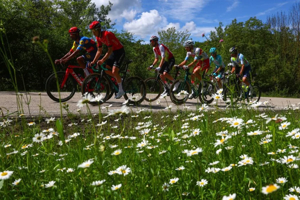 LtoR, Team Lidl-Trek's Eritrean rider Amanuel Ghebreigzabhier, Team Arkea's French rider Louis Barre, Team Cofidis' French rider Nicolas Debeaumarche, Team Polti-Kometa's Italian rider Andrea Pietrobon, Team Bardiani's Italian rider Filippo Fiorelli and Team Intermarche's French rider Lilian Calmejane compete during a breakaway in the stage 1 of the Giro d'Italia 2024 cycling race, 140 km between Venaria Reale and Torino on May 4, 2024.  The 107th edition of the Giro d'Italia, with a total of 3400,8 km, departs from Veneria Reale near Turin on May 4, 2024 and will finish in Rome on May 26, 2024. Luca Bettini / AFP