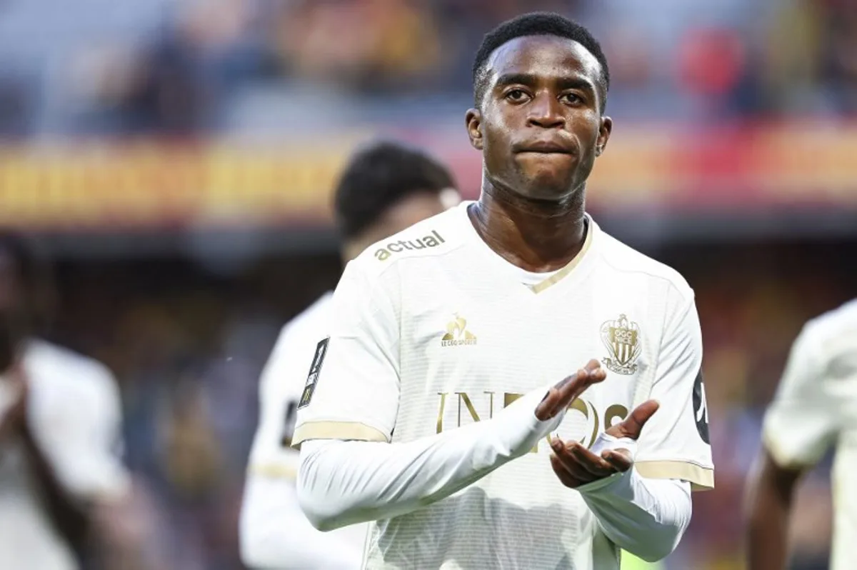 Nice's German forward #15 Youssoufa Moukoko acknowledges supporters at the of the French L1 football match between RC Lens and OGC Nice at Stade Bollaert-Delelis in Lens, northern France on September 28, 2024. Sameer Al-DOUMY / AFP