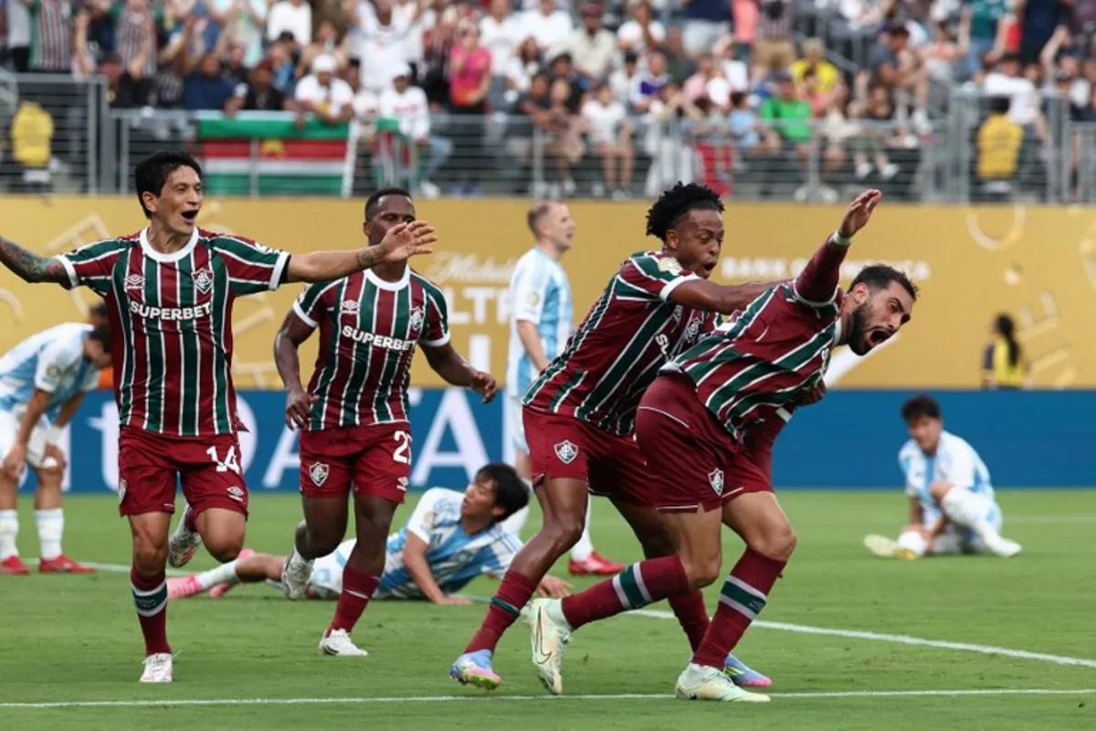 Fluminense's Argentine defender #22 Juan Pablo Freytes (R) celebrates with teammate Brazilian forward #11 Keno after scoring his team's third goal during the FIFA Club World Cup 2025 Group F football match between Brazil's Fluminense and South Korea's Ulsan HD at the MetLife stadium in East Rutherford, New Jersey on June 21, 2025. FRANCK FIFE / AFP