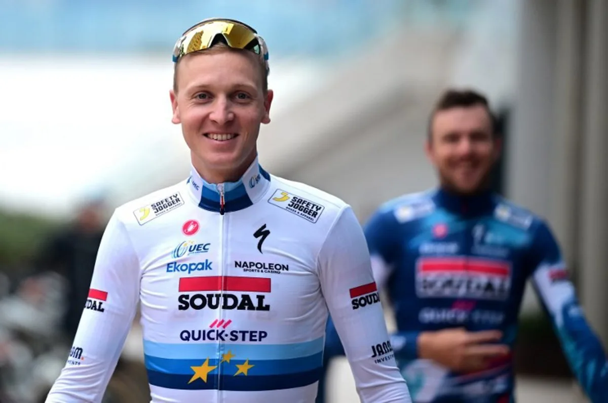 Team Soudal Quick-Step cyclist Belgian Tim Merlier smiles before a training session at Calpe, near Alicante, eastern Spain, on January 09, 2025.  JOSE JORDAN / STR / AFP