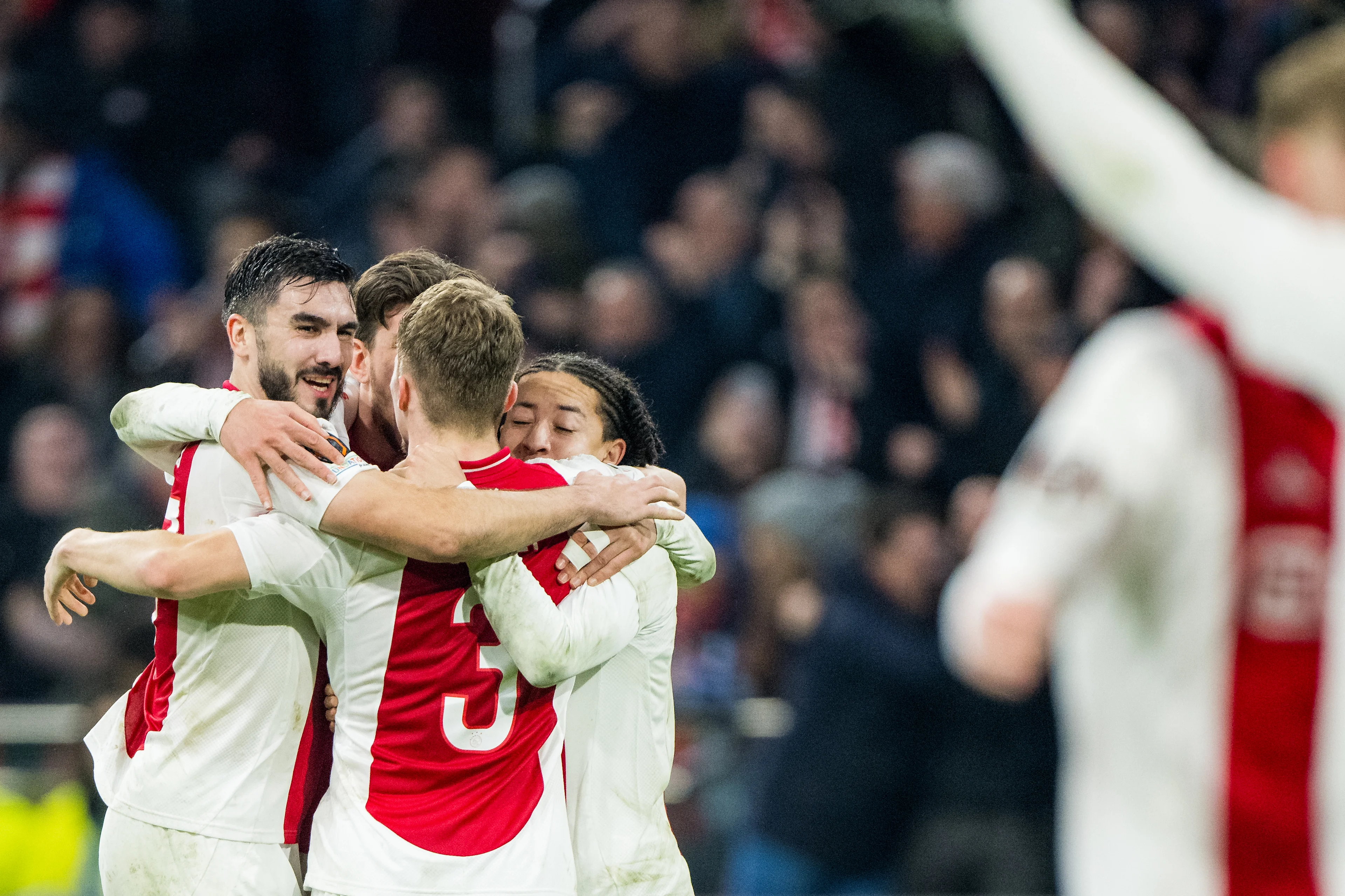 Ajax' players celebrate after a soccer match between Dutch AFC Ajax and Belgian Royale Union Saint-Gilloise, Thursday 20 February 2025 in Amsterdam, the Netherlands, the return leg of the Knockout phase play-offs of the UEFA Europa League competition. BELGA PHOTO JASPER JACOBS