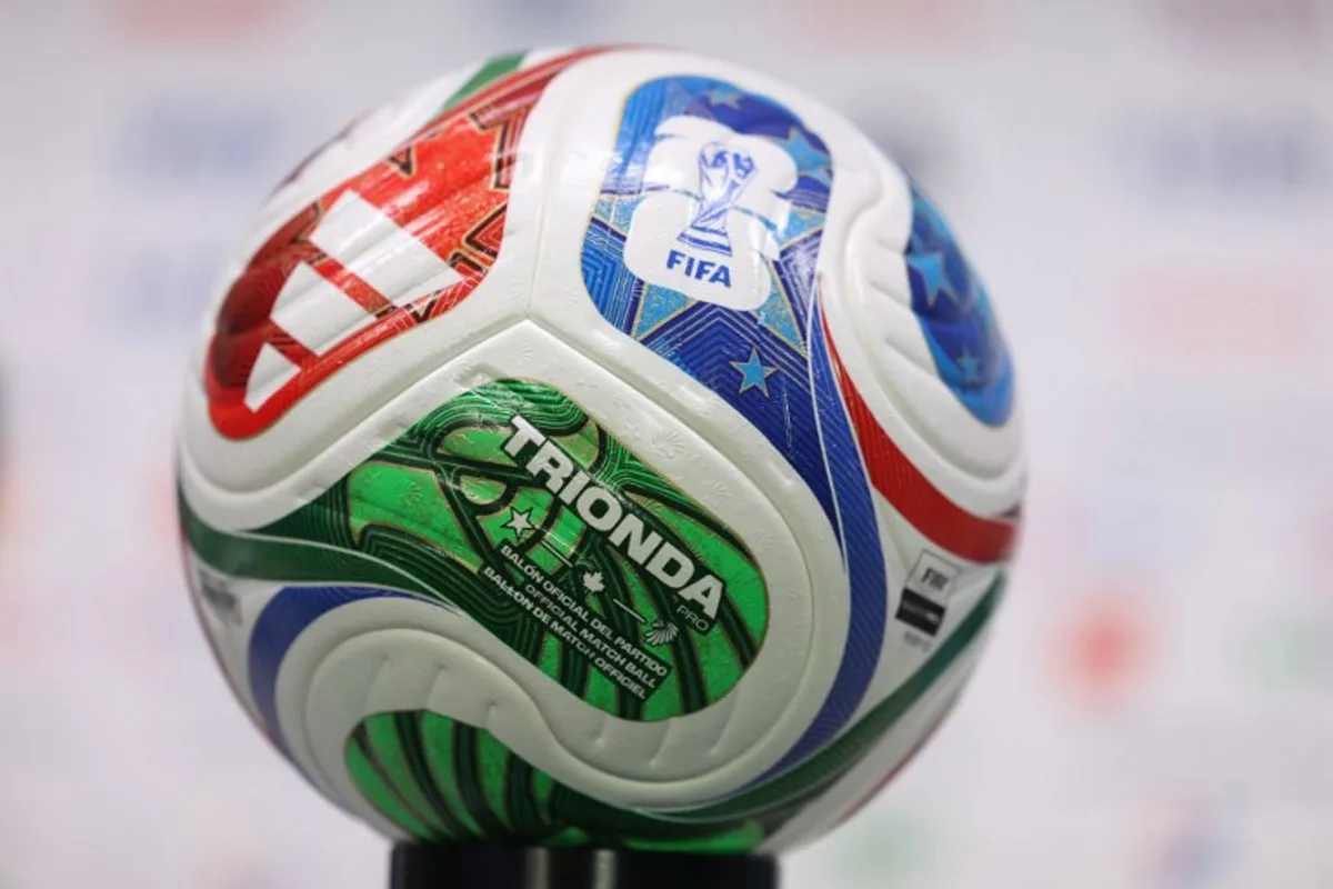 The 2026 World Cup official ball is displayed during a press conference at Monterrey stadium taken in Monterrey, on June 19, 2026, on the eve of the 2026 World Cup Group F football match between Tunisia and Japan. Julio Cesar AGUILAR / AFP