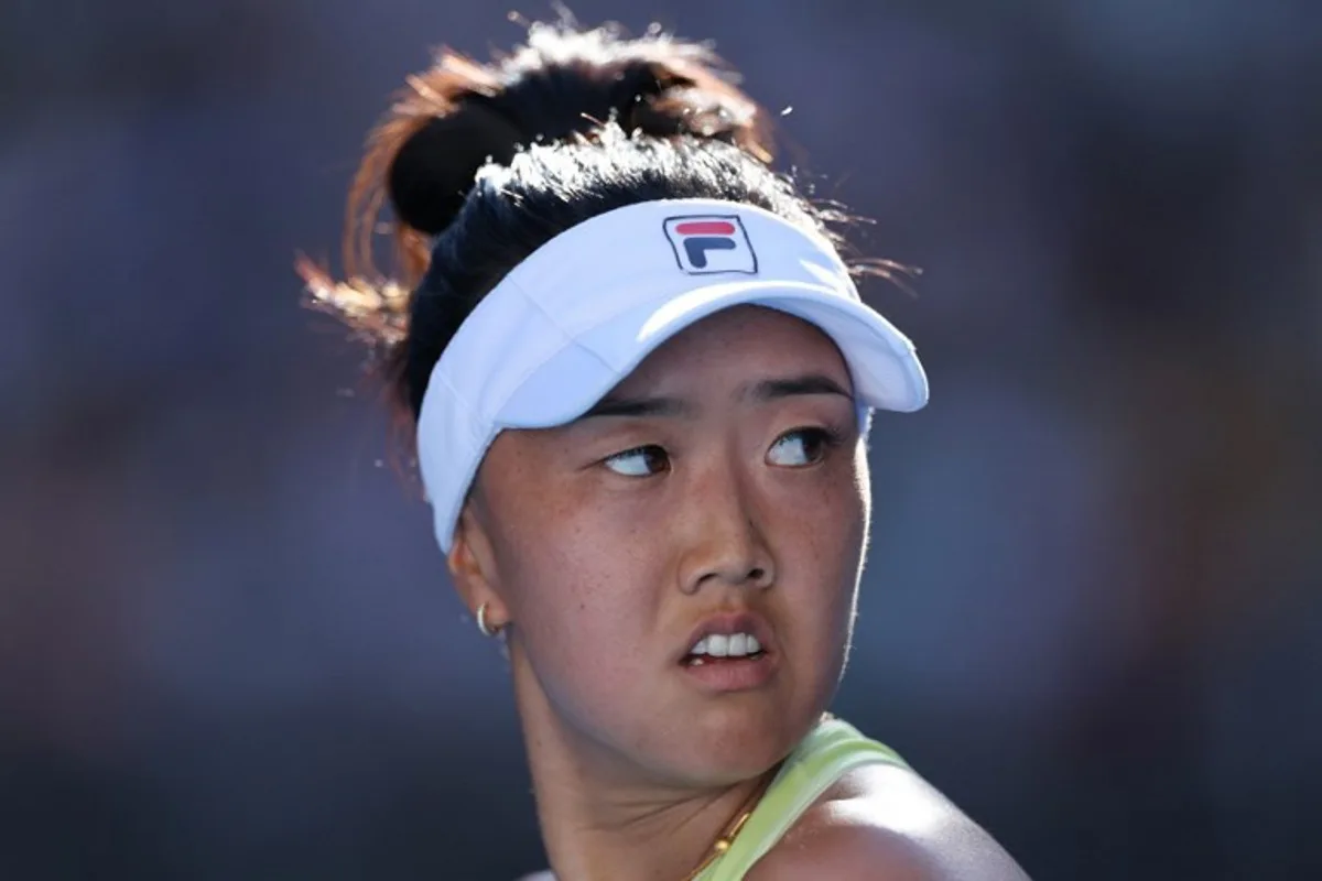 USA's Ann Li looks on during her women's singles match against USA's Madison Keys on day three of the Australian Open tennis tournament in Melbourne on January 14, 2025.  Adrian DENNIS / AFP