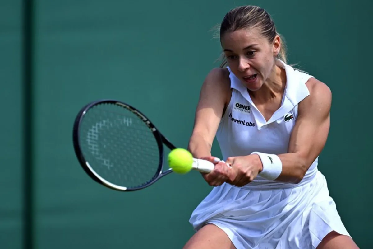 Poland's Maja Chwalinska returns the ball to Thailand's Mananchaya Sawangkaew during their women's singles first round tennis match on the first day of the 2026 Wimbledon Championships at The All England Lawn Tennis and Croquet Club in Wimbledon, southwest London, on June 29, 2026.  Kirill KUDRYAVTSEV / AFP