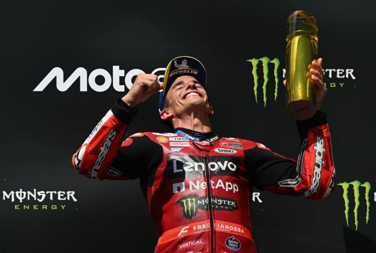 Team Ducati Lenovo Team's Marc Marquez celebrates on the podium after winning the MotoGP Grand Prix of Czechia in Brno, Czech Republic, on June 21, 2026. Michal Cizek / AFP