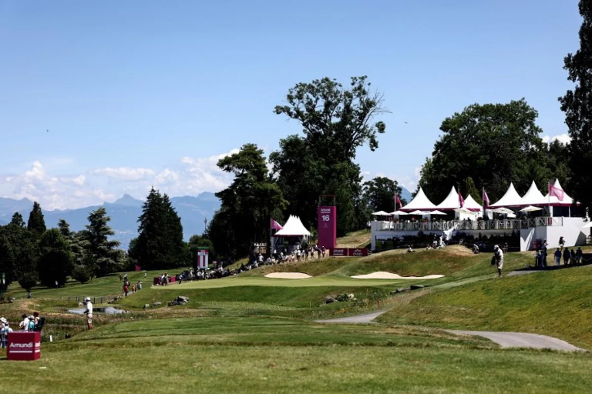 This photograph shows a general vieu of the 16th hole during the third round of the Amundi Evian Championship at Evian Resort Golf Club, in Evian-Les-Bains, eastern France on July 12, 2025. Alex MARTIN / AFP