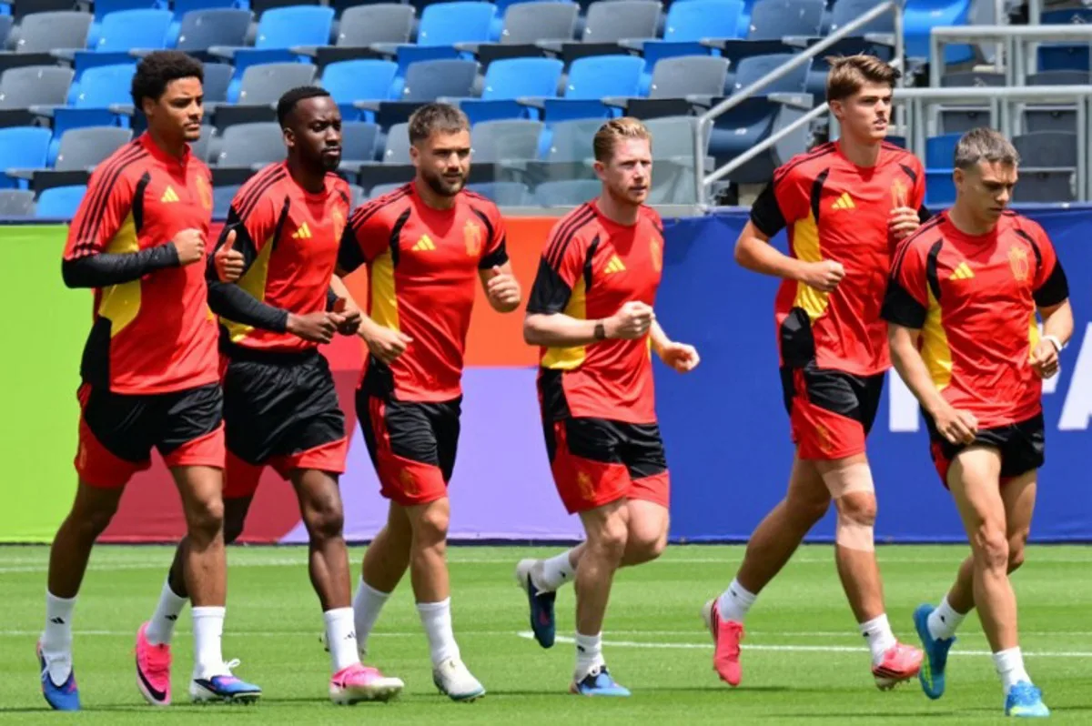 (From L) Belgium's defender #16 Koni de Winter, forward #14 Dodi Lukebakio, midfielder #23 Nicolas Raskin, midfielder #07 Kevin De Bruyne, forward #17 Charles De Ketelaere and forward #10 Leandro Trossard take part in a training session at Carson Sports Park in California on June 20, 2026, on the eve of their 2026 World Cup Group G match against Iran.  Frederic J. BROWN / AFP