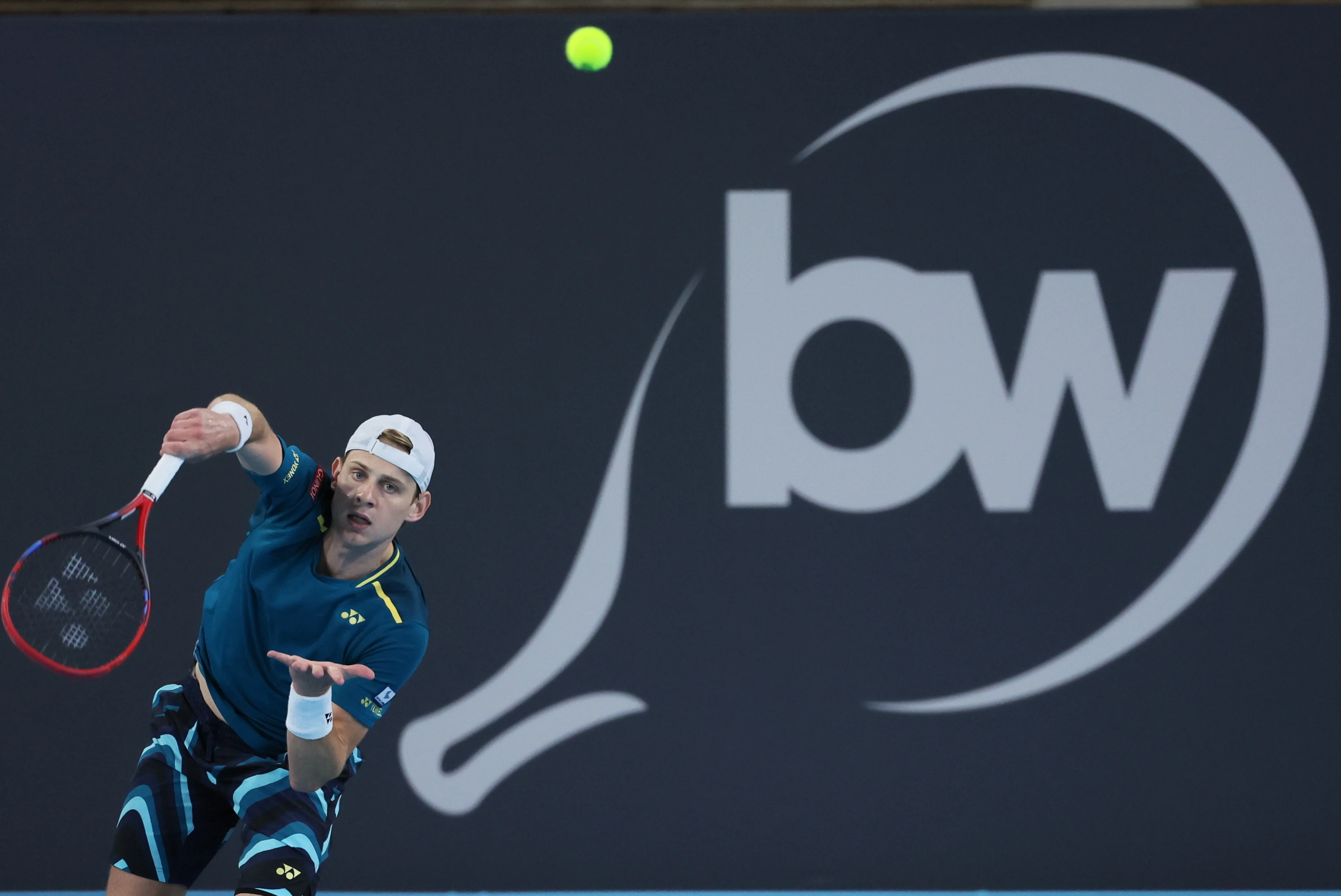 Belgian Zizou Bergs pictured in action during a tennis match against his compatriot Goffin, in the first round of the men's singles at the BW Open ATP Challenger 125 tournament, in Louvain-la-Neuve,  Tuesday 23 January 2024. THE BW Open takes place from 22 to 28 January.  BELGA PHOTO BENOIT DOPPAGNE