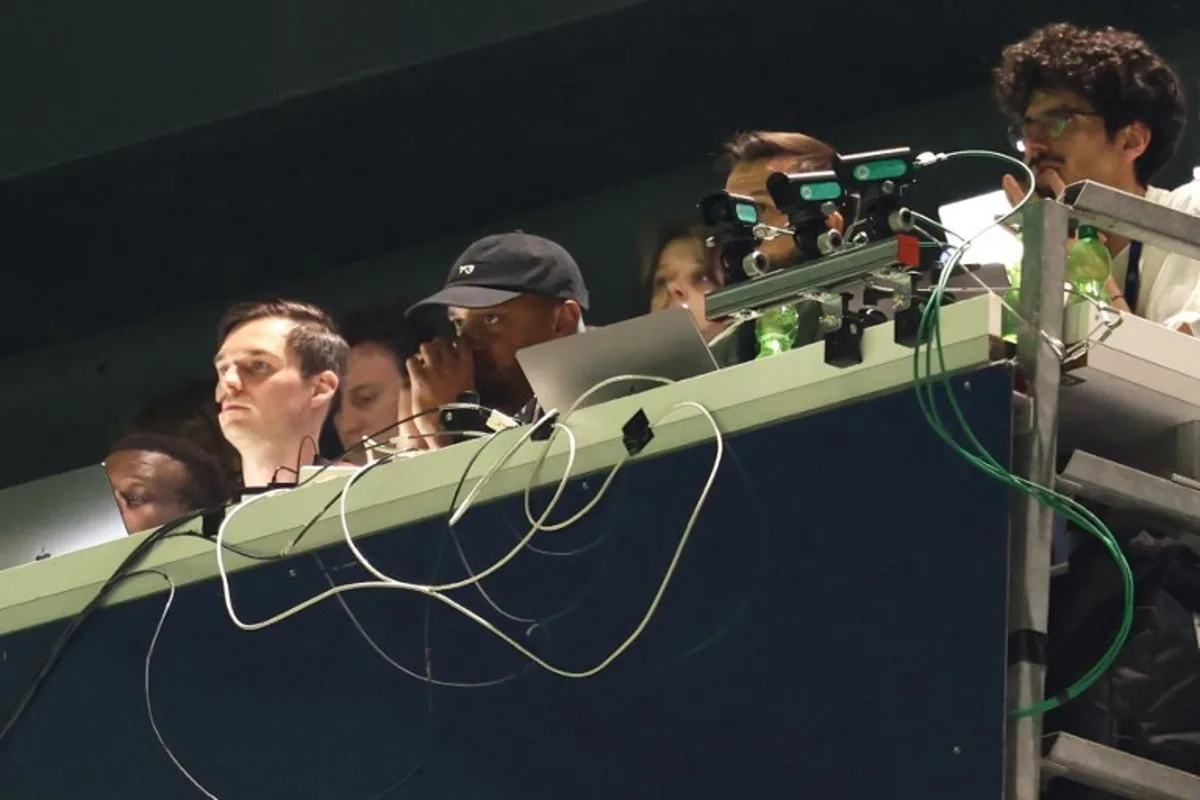 Bayern Munich's Belgian coach Vincent Kompany looks on from the stands during the UEFA Champions League semi-final first leg football match between Paris Saint-Germain (PSG) and Bayern Munich at the Parc des Princes in Paris on April 28, 2026.  FRANCK FIFE / AFP