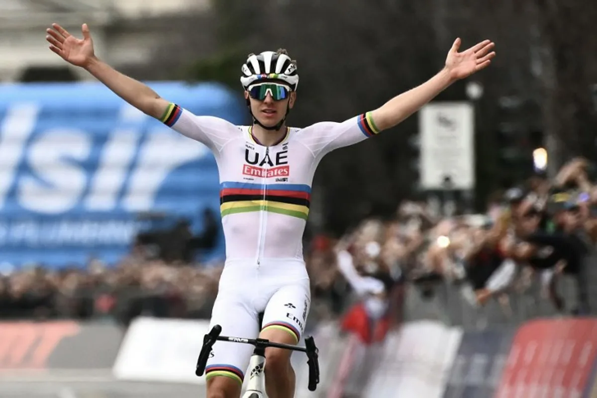 UAE Team Emirates team's Slovenian rider Tadej Pogacar cycles to the finish line to win the 118th edition of the Giro di Lombardia (Tour of Lombardy), a 252km cycling race from Bergamo to Como on October 12, 2024.  Marco BERTORELLO / AFP