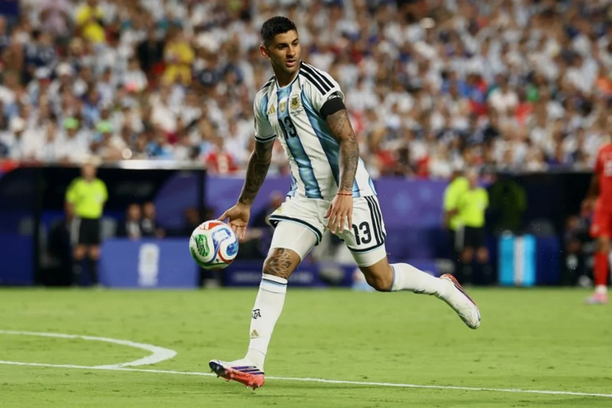 Argentina's defender #13 Cristian Romero runs during the 2026 World Cup football tournament quarter-final match between Argentina and Switzerland at the Kansas City Stadium in Kansas City on July 11, 2026.   CHARLY TRIBALLEAU / AFP