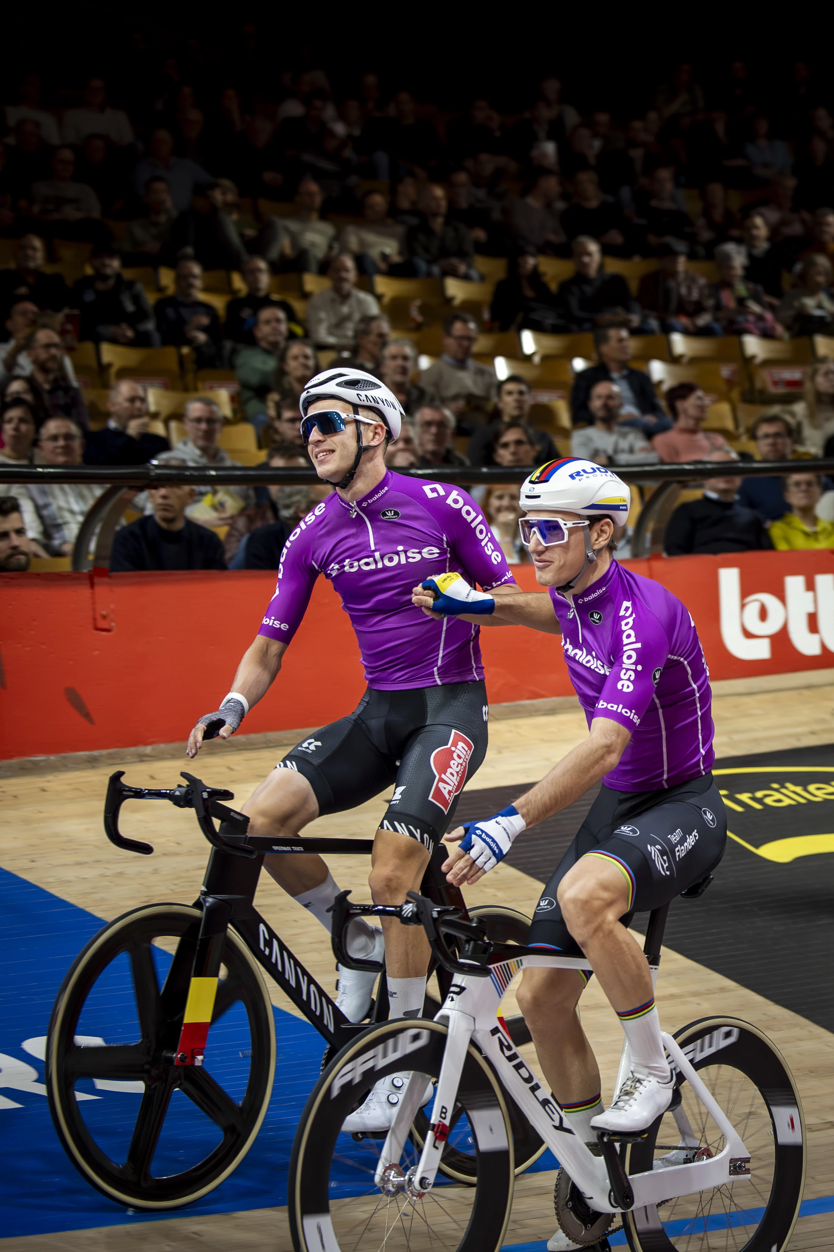 Belgian Robbe Ghys and Belgian Lindsay De Vylder pictured during day four of the Zesdaagse Vlaanderen-Gent six-day indoor track cycling event at the indoor cycling arena 't Kuipke, Friday 15 November 2024, in Gent. BELGA PHOTO DAVID PINTENS