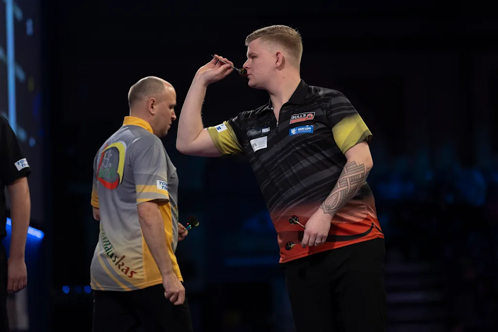 ATTENTION EDITORS - HAND OUT PICTURES - EDITORIAL USE WITH STORY ON DARTS WORLD CHAMPIONSHIPS ONLY - MANDATORY CREDIT LAWRENCE LUSTIG/PDC  Hand out pictures released on Saturday 18 December 2021, by PDC Professional Darts Corporation shows Belgian Mike De Decker pictured during the game between Lithuanian Labanauskas and Belgian De Decker, in the first round of the William Hill World Championships, in London, UK. MANDATORY CREDIT KELLY DECKERS/PDC EUROPE