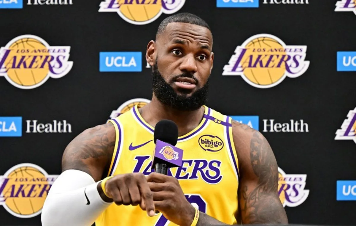 Los Angeles Lakers #23 LeBron James speaks to the press during the Lakers media day at UCLA Health Training Center in El Segundo, California, September 30, 2024.  Frederic J. BROWN / AFP