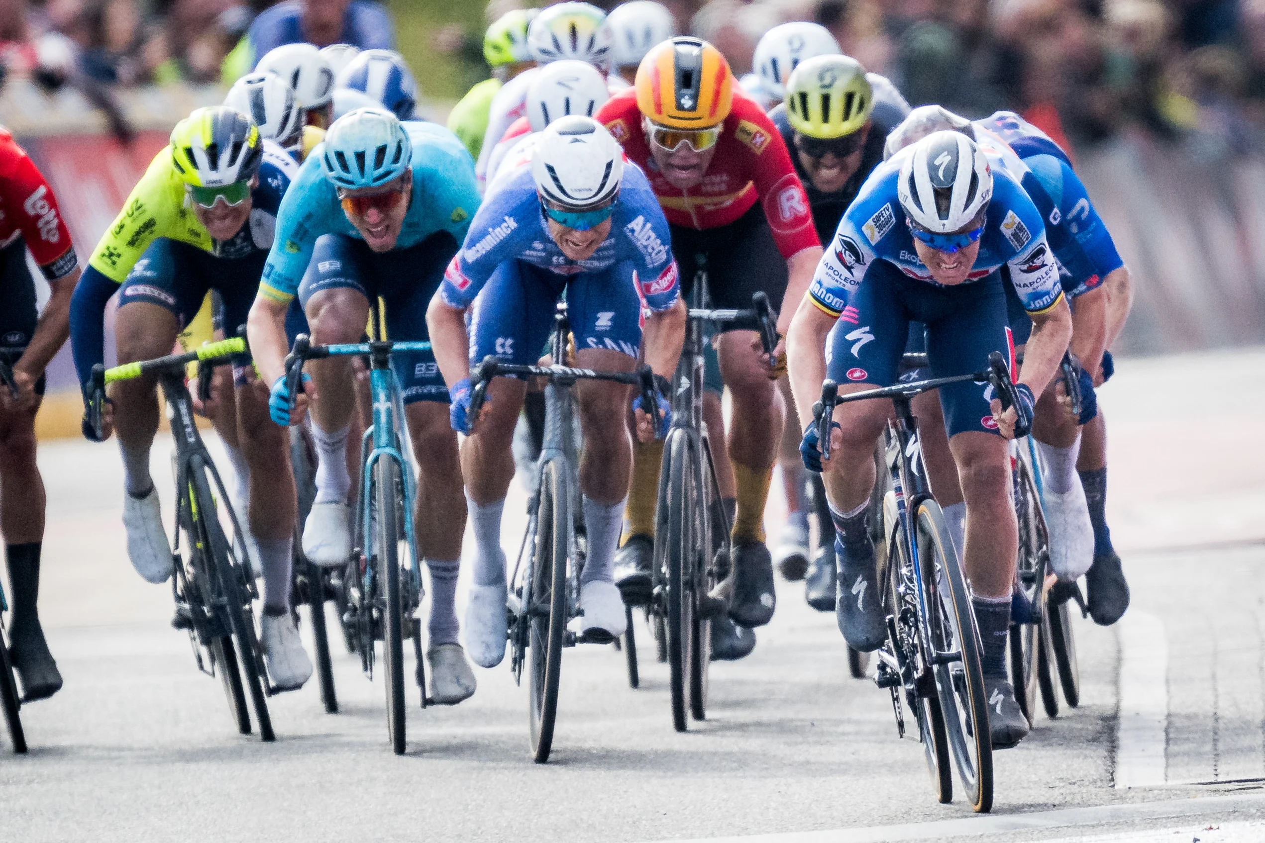 Belgian Jasper Philipsen of Alpecin-Deceuninck, Belgian Tim Merlier of Soudal Quick-Step and Dutch Dylan Groenewegen of Team Jayco Alula pictured in action during the men's race of the 112th edition of the 'Scheldeprijs' one day cycling event, 205,3 km from Terneuzen, the Netherlands to Schoten, Belgium on Wednesday 03 April 2024. BELGA PHOTO TOM GOYVAERTS