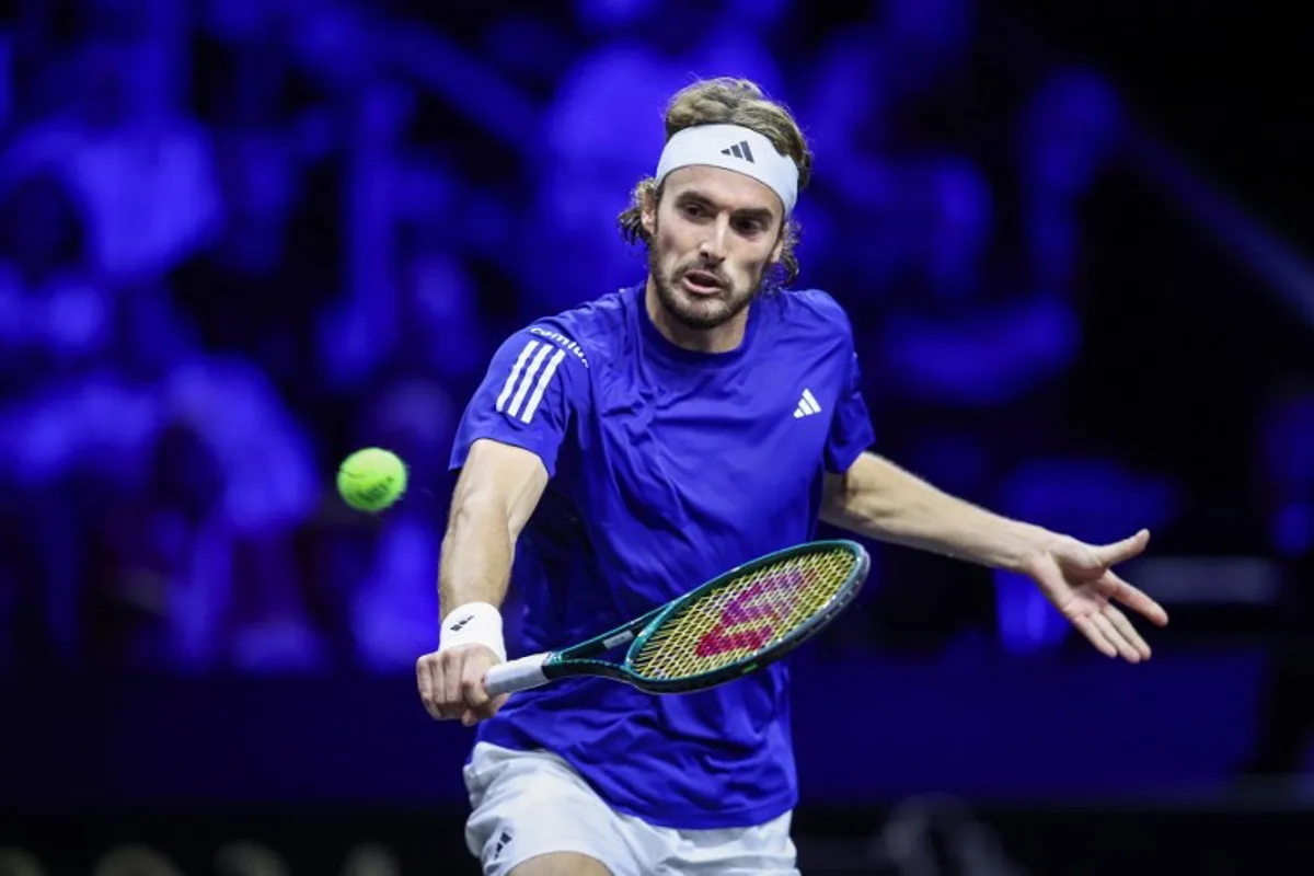 Greece's Stefanos Tsitsipas of Team Europe returns the ball to Australia's Thanasi Kokkinakis of Team World during their 2024 Laver Cup men's singles tennis match in Berlin, Germany on September 20, 2024.  Ronny Hartmann / AFP