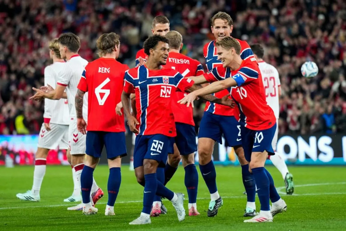 Norway's midfielder #22 Oscar Bobb (C) celebrates scoring his team's first goal with teammates during the UEFA Nations League Group A4 football match between Norway and Denmark in Oslo on September 24, 2026. Fredrik Varfjell / NTB / AFP
