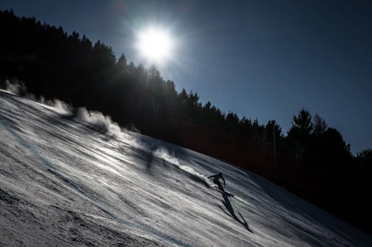 Liechtenstein's Marco Pfiffner skies during a training session head of the Men's downhill race of the FIS Alpine Skiing World Cup event, in Bormio on December 27, 2024.  Fabrice COFFRINI / AFP