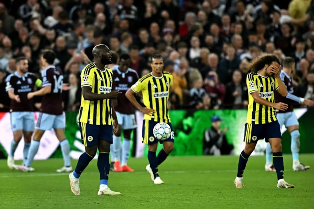 Fenerbahce's Belgian striker #09 Romelu Lukaku reacts after Aston Villa's English midfielder #06 Ross Barkley scores the team's fifth goal during the UEFA Champions League, league phase football match between Aston Villa and Fenerbahce at Villa Park in Birmingham, central England on October 14, 2026.   Paul ELLIS / AFP